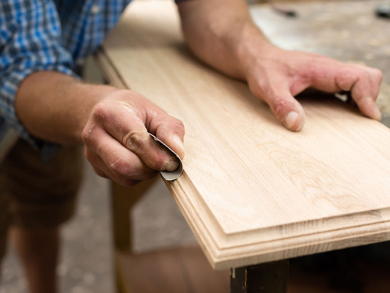 Sanding a piece of solid wood